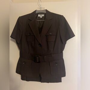 Never worn brown suit with safari jacket and skirt.